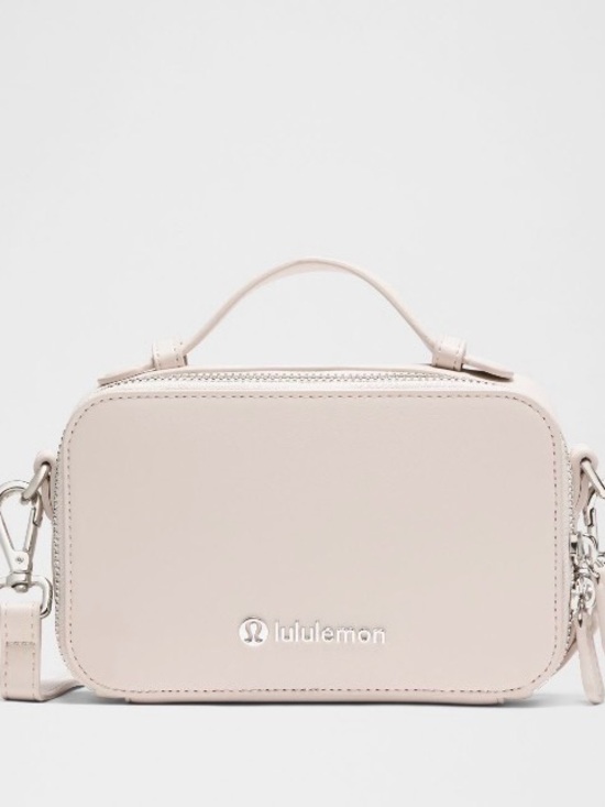 lululemon athletica Handbags - lululemon athletica leather alternative camera bag NWOT